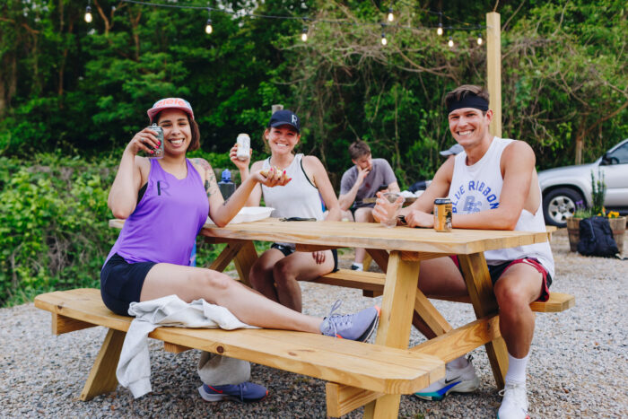 The Laboratory Run Club, runners having beverages after the run