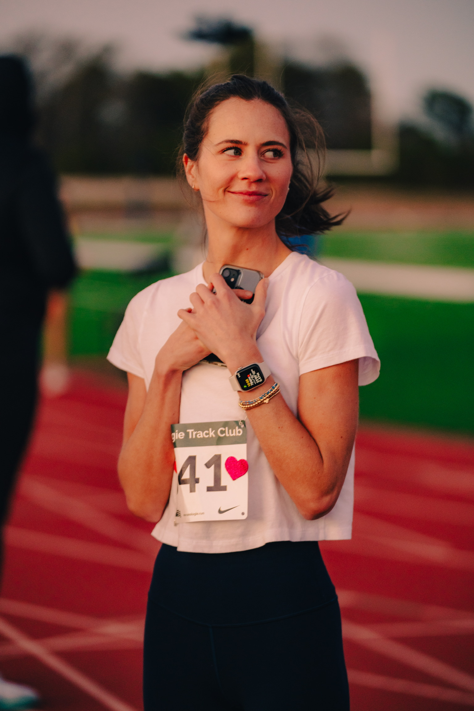 Runner on the track at a Galentine's meet.